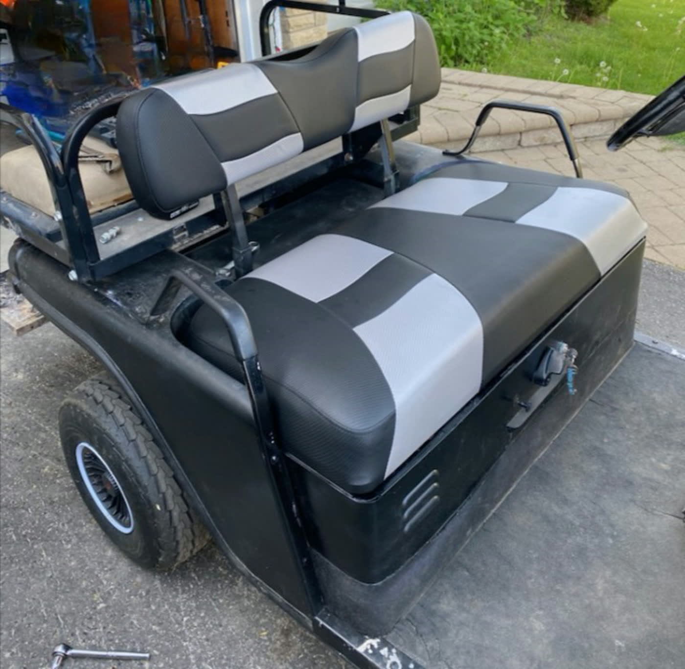 Golf cart bench rebuilt in two-tone black and silver